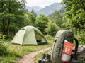 Pee bag in the side pocket of a backpack next to a tent