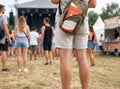 Pee bag in a waist bag at a festival