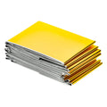 Folded double-sided emergency blankets, gold and silver